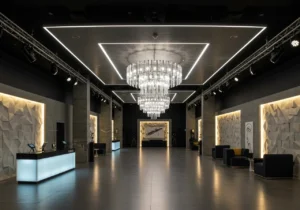 A sophisticated room with carefully placed LED lights along the ceiling and walls.